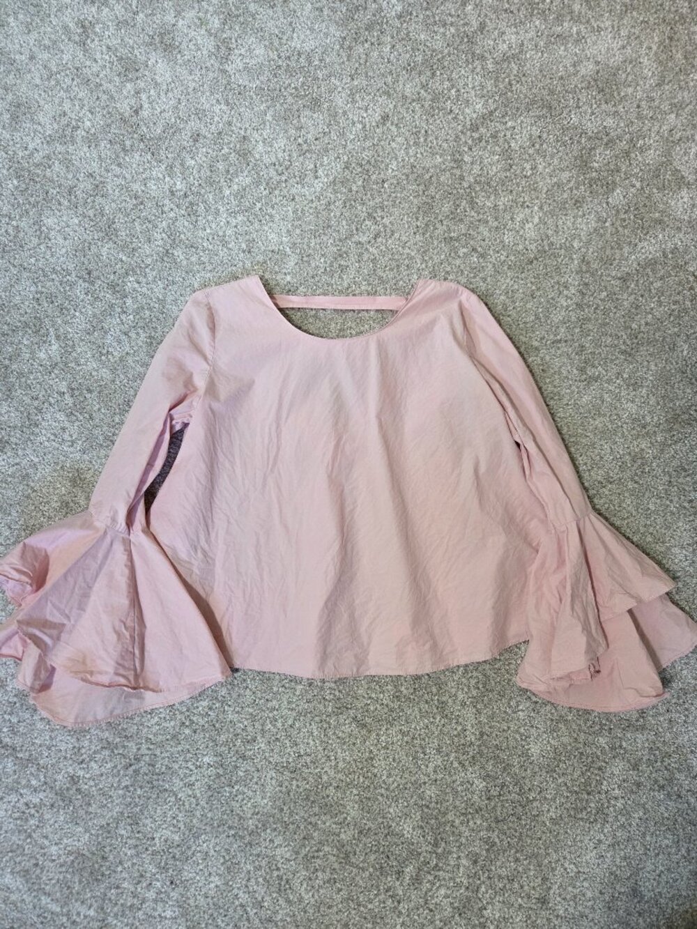 Pink top with bell sleeves